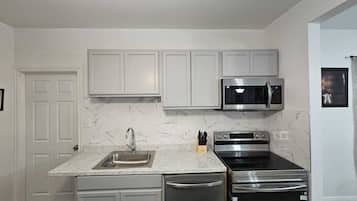 Microwave, stovetop, dishwasher, coffee/tea maker