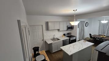 Microwave, stovetop, dishwasher, coffee/tea maker