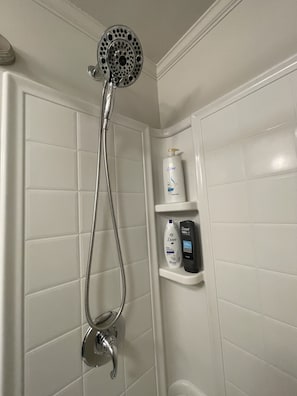 Hair dryer, towels, soap, shampoo
