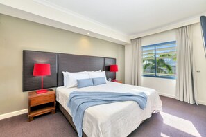 1 bedroom, desk, iron/ironing board, travel crib