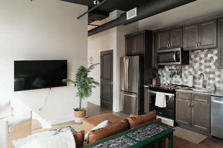 Microwave, oven, stovetop, dishwasher. Cozy Downtown Troy Studio • Walk Everywhere