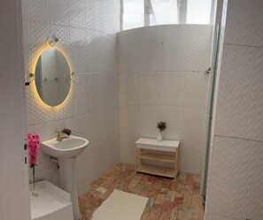 Shower, hair dryer, towels, soap - 2 bedroom apartment Porto Barra sea view (Barra Salvador)