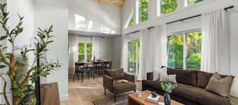 Modern Riverfront Chalet w/ Firepit & Hot Tub