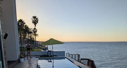 WATERFRONT bed & breakfast in charm filled Port Isabel w/ Pool, Spa, Gym Area