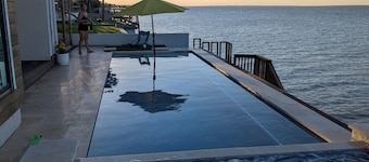 WATERFRONT bed & breakfast in charm filled Port Isabel w/ Pool, Spa, Gym Area