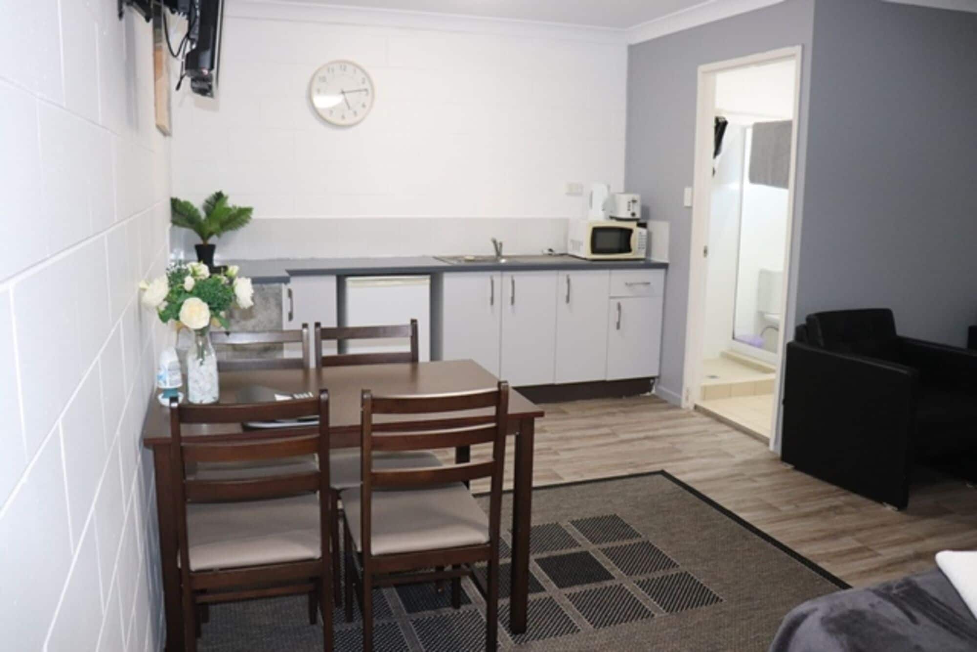 Deluxe Studio | Living area | TV