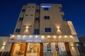 A hotel facade with signage for 'Hotel Paraspalace' and 'Naksh Mobile Spare Parts and Repairing'. - Fabhotel Paras Palace (Bhopal)