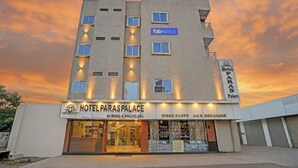 A multi-story hotel named 'Hotel Paras Palace' with a sign indicating 'AC Rooms' and 'Banquet Hall' on the ground floor. - Fabhotel Paras Palace (Bhopal)