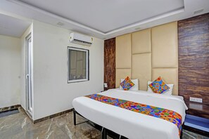 Habitación Deluxe | Sábanas de algodón egipcio y ropa de cama de alta calidad 