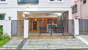 A gated entrance to a property with a sign indicating 'The Seven Wonders'. - Fabhotel 85 The Seven Wonders (Barasat)