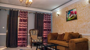 Studio – deluxe, balkong | Oppholdsområde