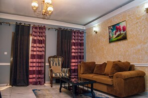 Studio – deluxe, balkong | Oppholdsområde