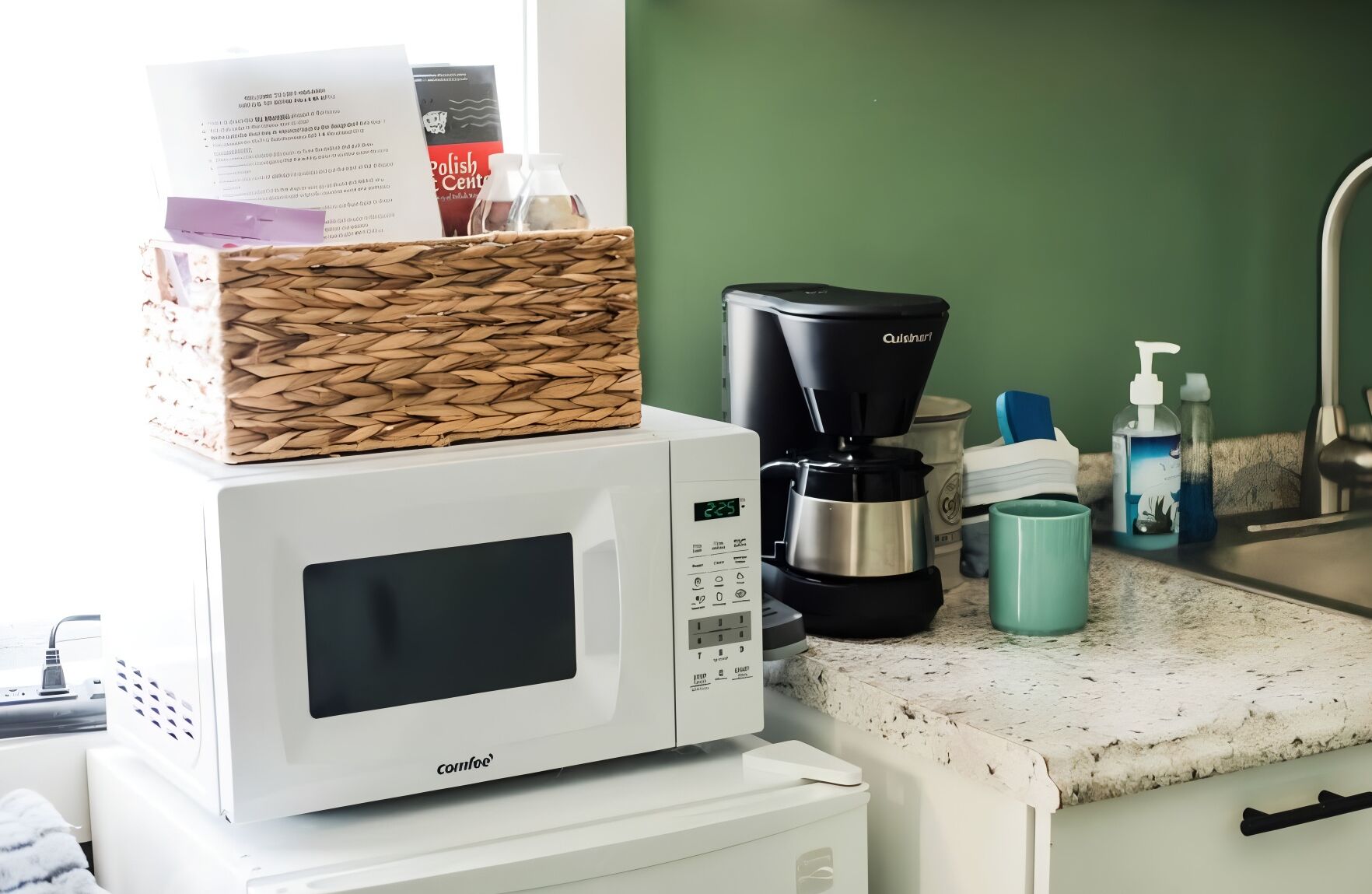 Fridge, microwave, coffee/tea maker, cookware/dishes/utensils