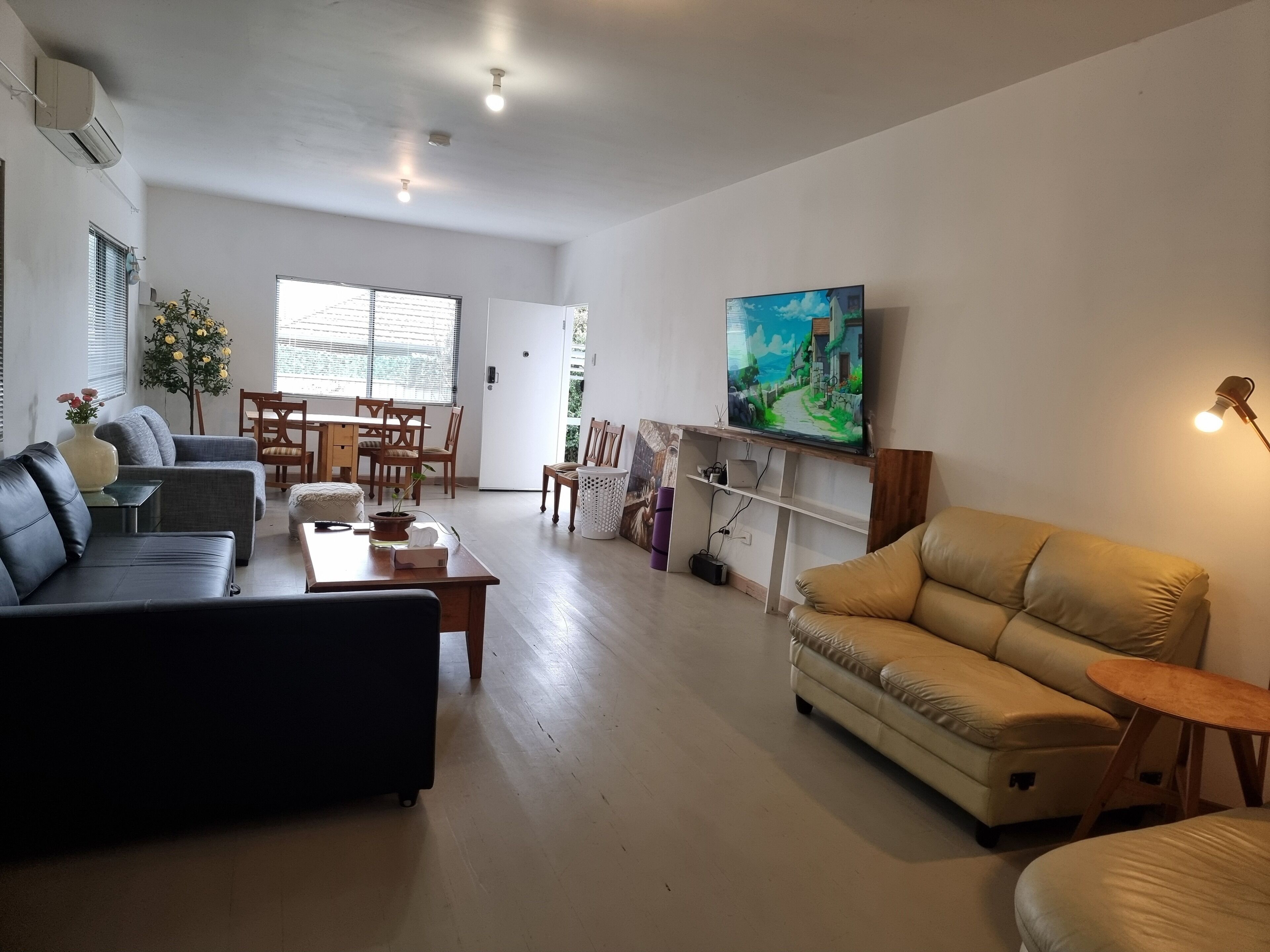 The living room is separate from the main sleeping areas.