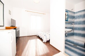 Apartamento | 1 quarto, ferros/tábuas de passar roupa, roupa de cama