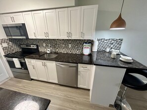 Appartement Confort, patio, vue jardin | Cuisine privée