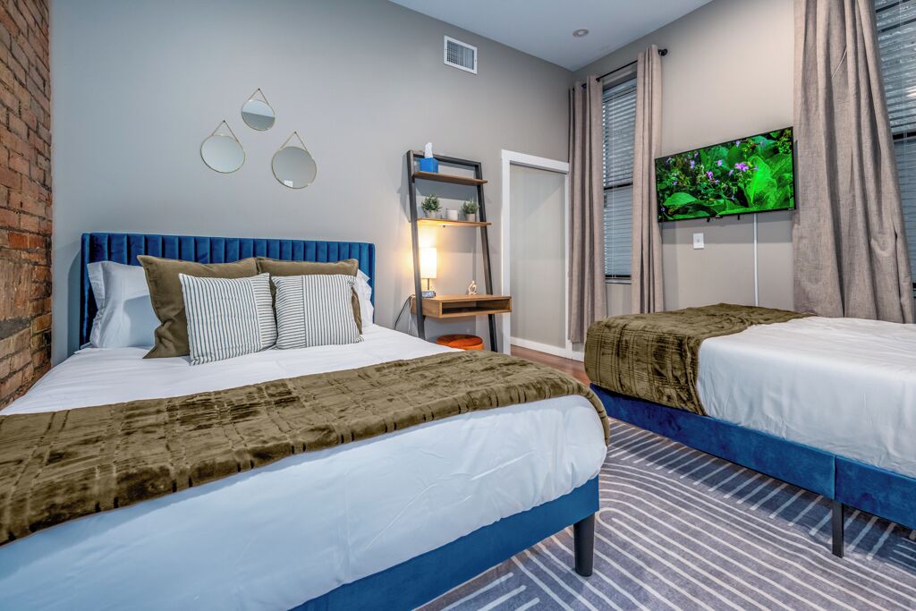 1 bedroom, desk, iron/ironing board, travel crib