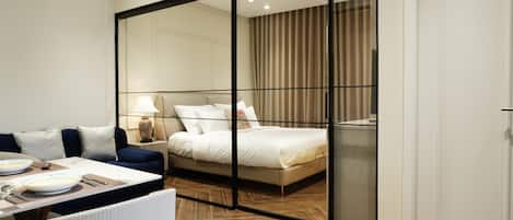 Deluxe-Apartment, 1 King-Bett, Küche, Stadtblick | Wohnbereich