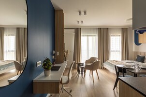 Studio, Balcony | Living area | 55-inch Smart TV with cable channels