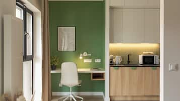 Studio Suite, Balcony, City View | Private kitchen | Full-sized fridge, microwave, stovetop, dishwasher