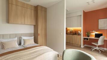 Studio Suite, Balcony, City View | Desk, laptop workspace, iron/ironing board, free WiFi