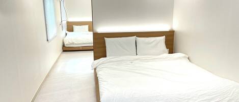 Classic Quadruple Room, Multiple Beds (Self Check-in) | Iron/ironing board, free WiFi