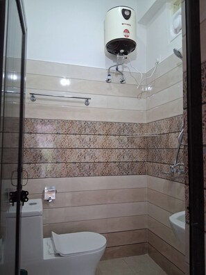 Ducha, toallas y jabón