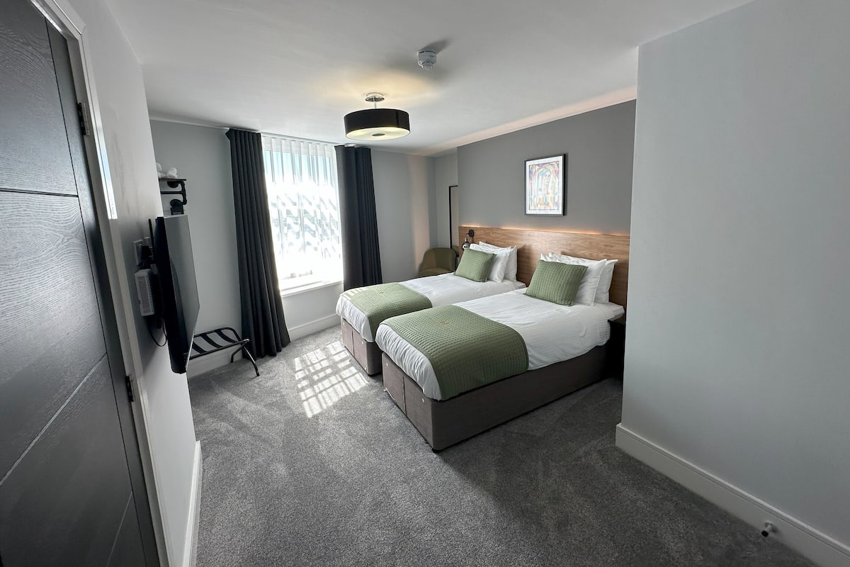 Blackout curtains, soundproofing, iron/ironing board, free WiFi