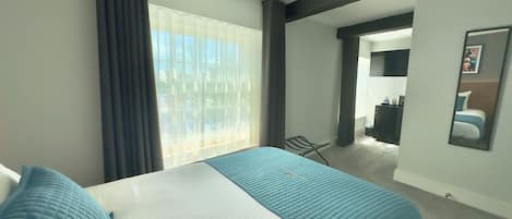 Blackout drapes, soundproofing, iron/ironing board, free WiFi