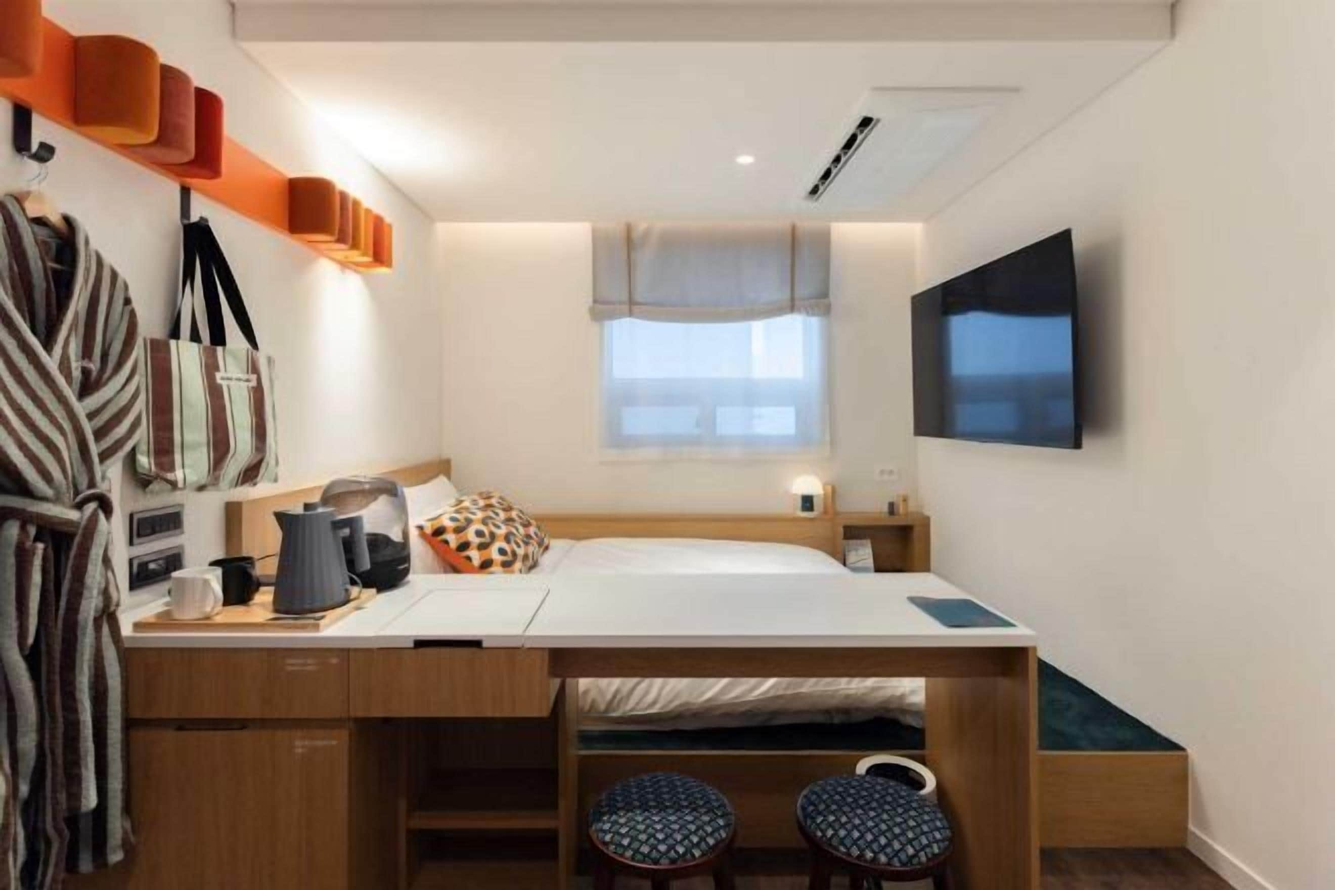 Desk, blackout drapes, soundproofing, free WiFi