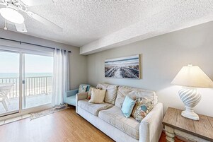 Signature Condo, Balcony, Beach View | Living room | 65-inch Smart TV with digital channels
