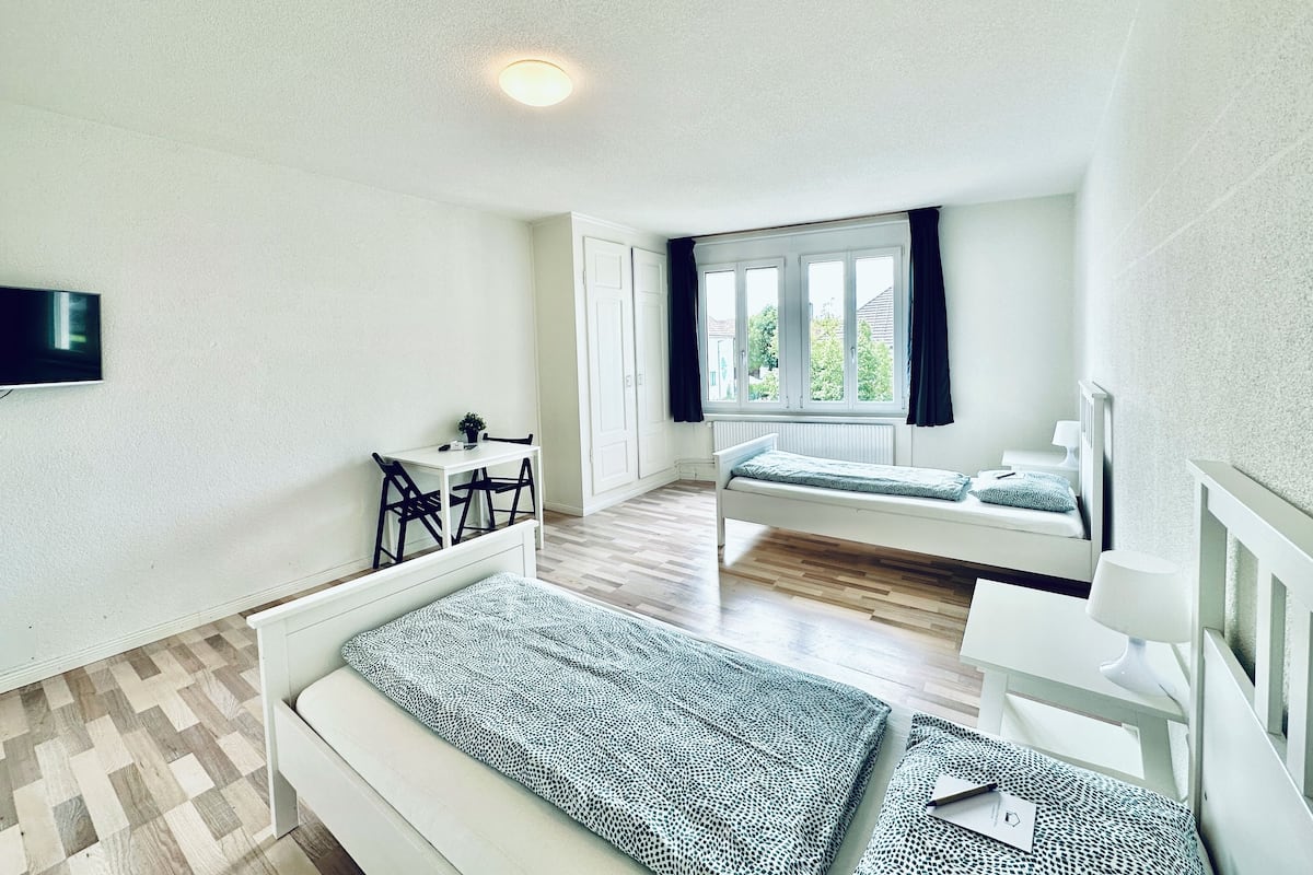 Desk, laptop workspace, free WiFi, bed sheets
