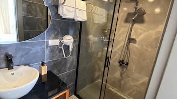 Shower, hair dryer, bathrobes, slippers
