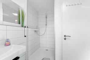 Shower, free toiletries, hair dryer, towels