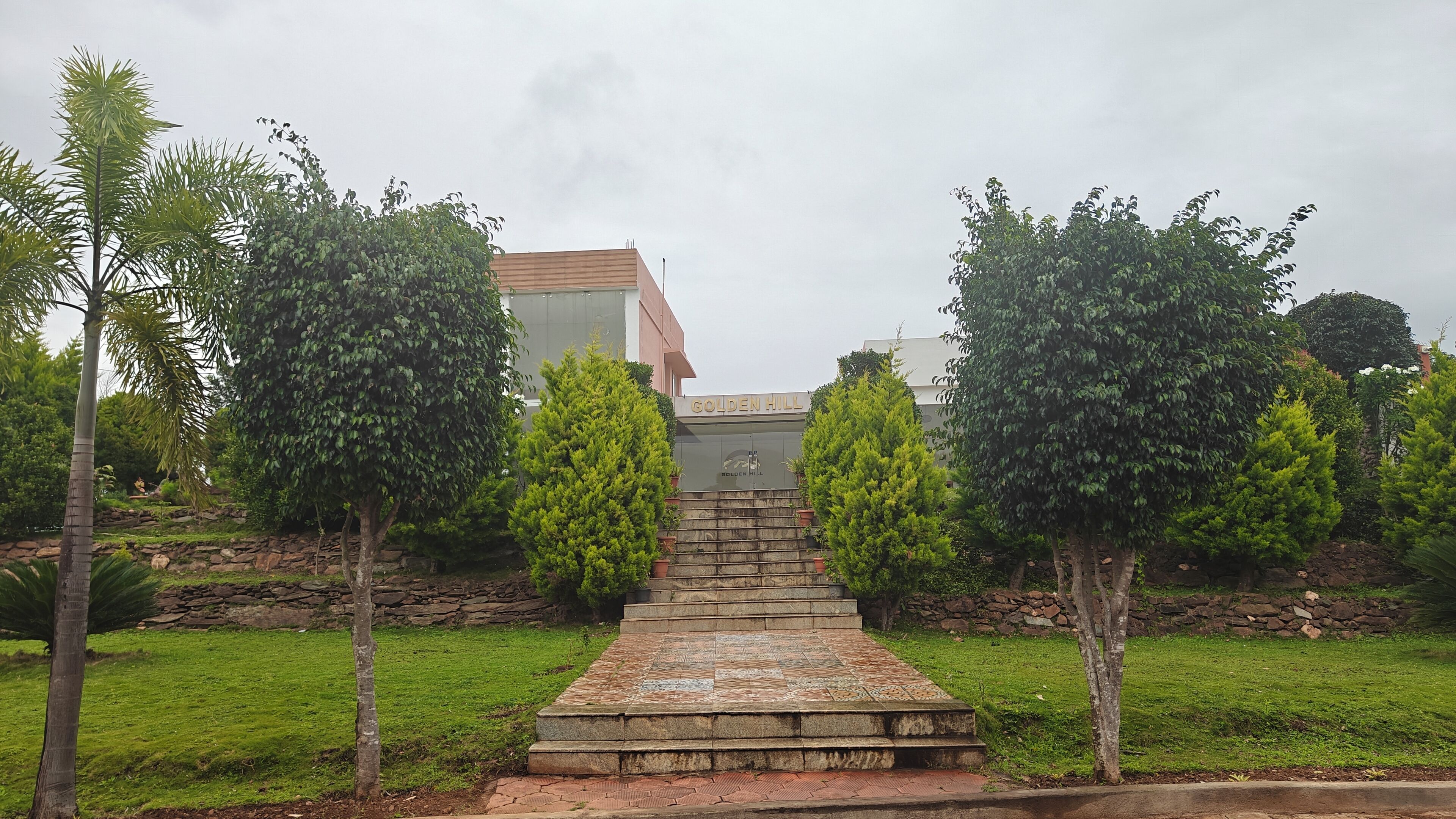 A stone staircase leading to a building labeled "Golden Hill."