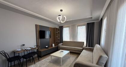Modern 1+1 Daire - Otel konforunda eşyalı ve mutfaklı geniş alanlı daire