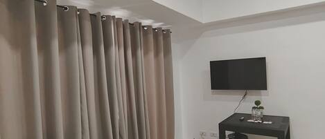 1 غرفة نوم ومكواة/لوح كي وخدمة الإنترنت وملاءات أسرّة