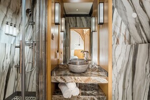 Apartment, City View | Bathroom | Rainfall showerhead, eco-friendly toiletries, hair dryer, towels