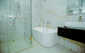Premium Double Room | Bathroom | Combined shower/tub, deep soaking tub, hydromassage showerhead