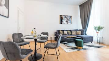 Design Apartment, Pets Allowed, City View | Living area | 43-inch Smart TV with digital channels