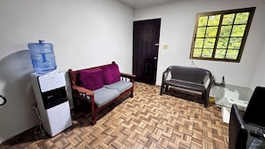 Family Apartment, 2 Bedrooms | Living area | 50-inch Smart TV with digital channels