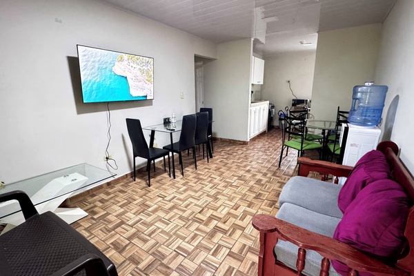 Family Apartment, 2 Bedrooms | Living area | 50-inch Smart TV with digital channels
