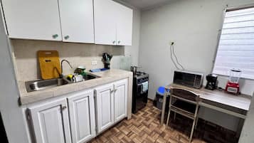 Family Apartment, 2 Bedrooms | Private kitchen | Microwave, coffee/tea maker