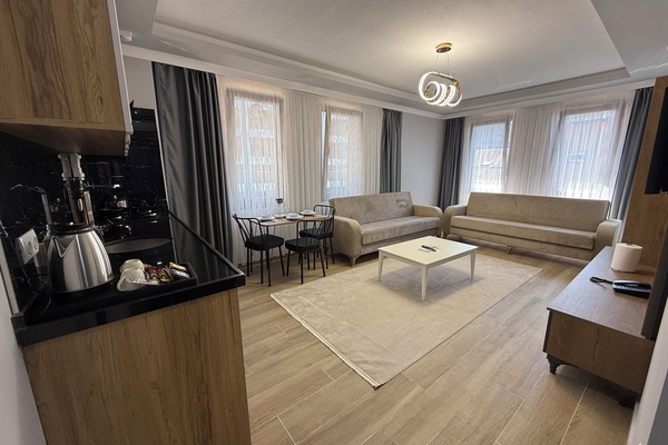 Deluxe Apartment, Balcony, Partial Sea View | Living area