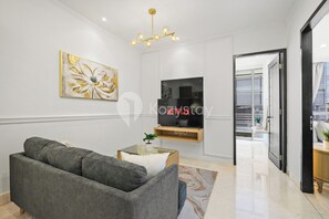 Apartment, 2 Bedrooms, City View | Living area | Flat-screen TV