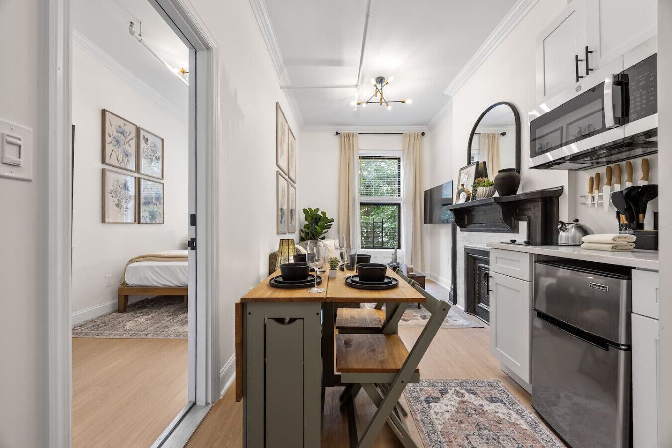 Microwave, stovetop, coffee/tea maker, cookware/dishes/utensils