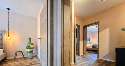 Alpha Apartments: 3BR Grand Space, Urban Harmony