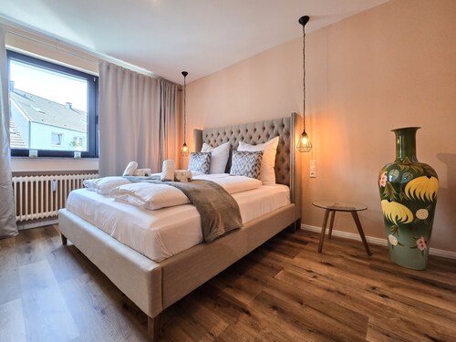 Alpha Apartments: 3BR Grand Space, Urban Harmony