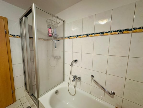 Hair dryer, towels, soap, toilet paper