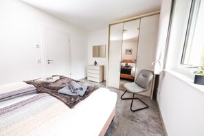 3 habitaciones, caja de seguridad en la habitación y cuna de viaje